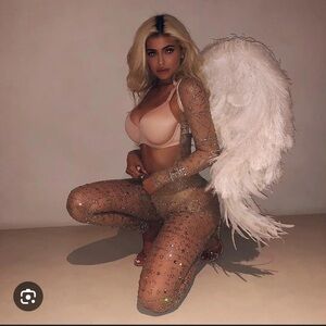 Glam one piece nude sequence Jeweled Cat suit size medium